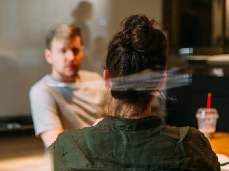 Two people talking
